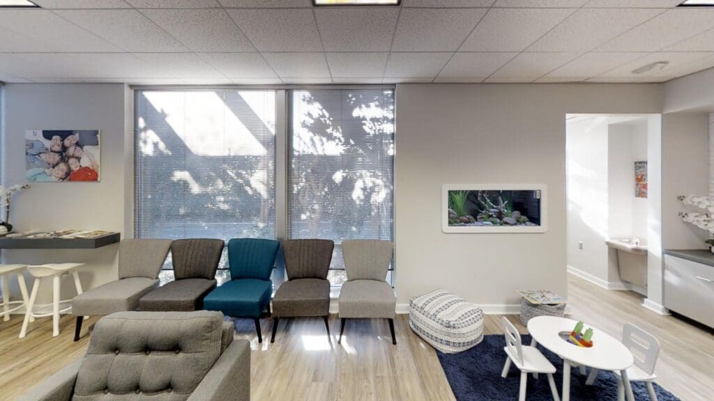 The waiting room at Brodie Bowman Orthodontics in Fort Walton Beach, with kids' play corner and aquarium