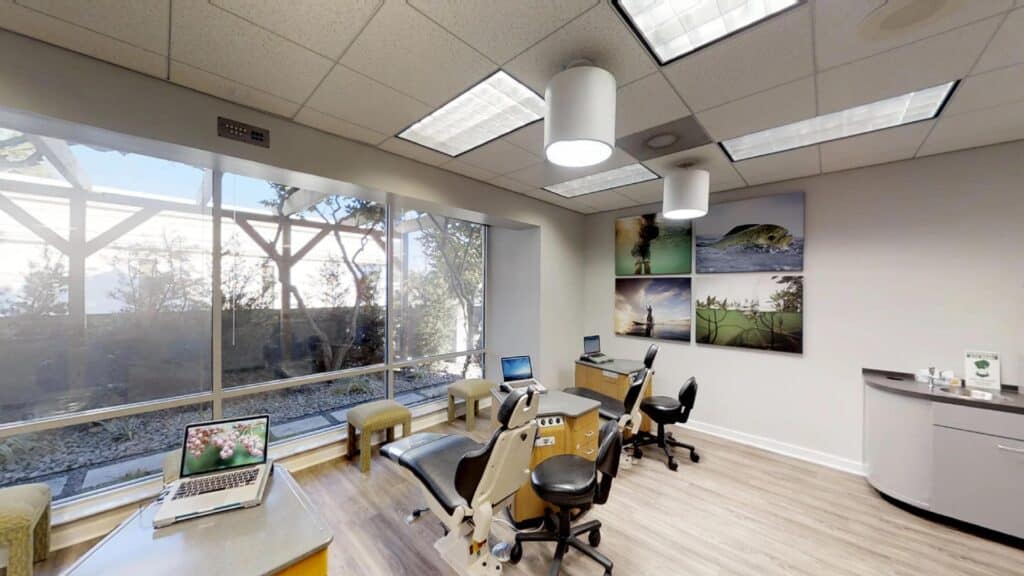 The treatment bay at Brodie Bowman Orthodontics, real chairs with a view of the trees on Racetrack Road