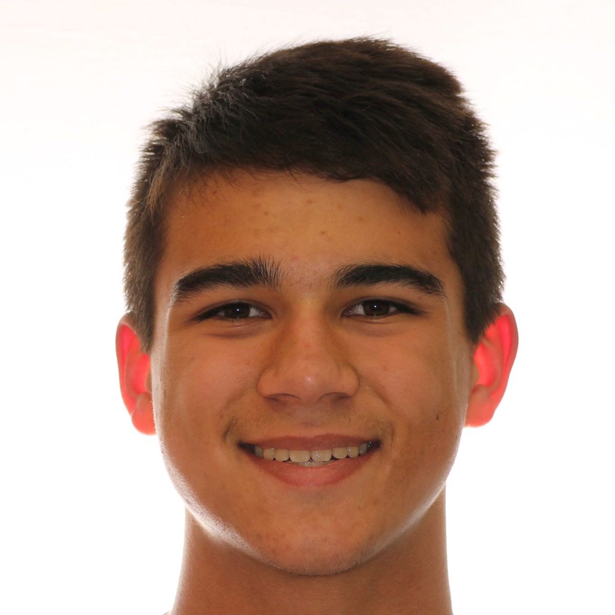 Brodie Bowman Orthodontics patient smiling in the after treatment photo